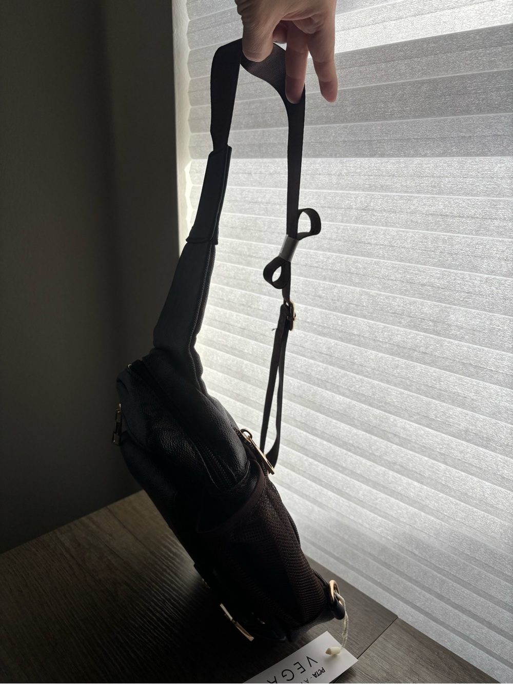 Brown Sling Backpack with Signature Pattern - Picture 3 of 8